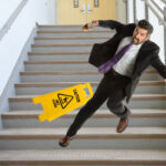 Hispanic Businessman Falling on stairs