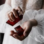 020521400_1666862818-fiancee-white-fashionable-dress-with-beautiful-sleeves-perfume-hands