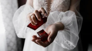 020521400_1666862818-fiancee-white-fashionable-dress-with-beautiful-sleeves-perfume-hands